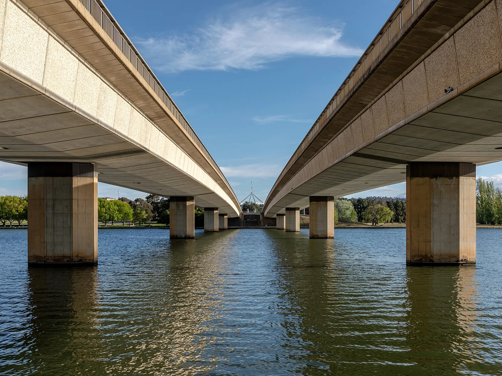 Twin bridge spans crossing a river